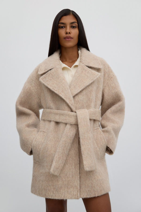 Women's beige wool trench coat.