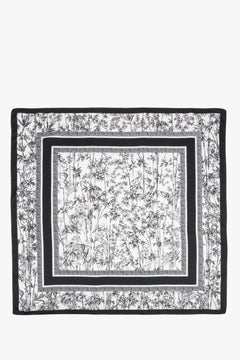 Women’s black-and-white jungle-print scarf by Estro.