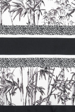 Women’s scarf in black and white with a jungle motif, by Estro.