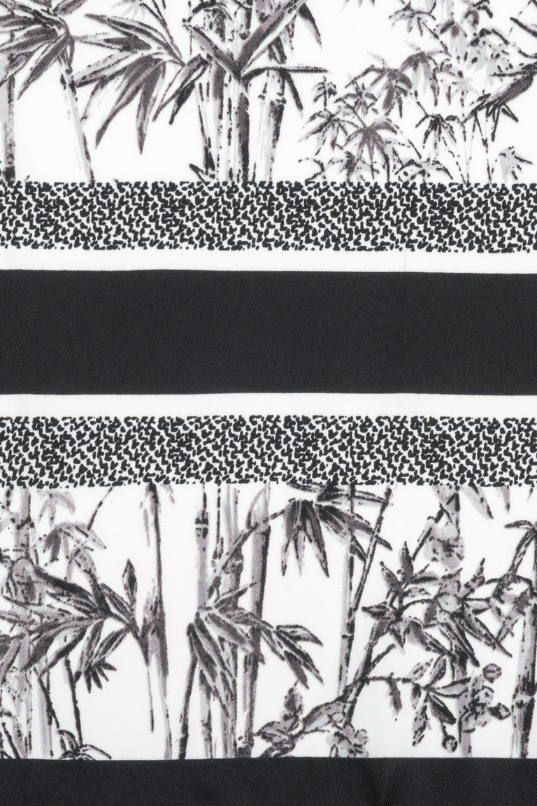 Women’s scarf in black and white with a jungle motif, by Estro.