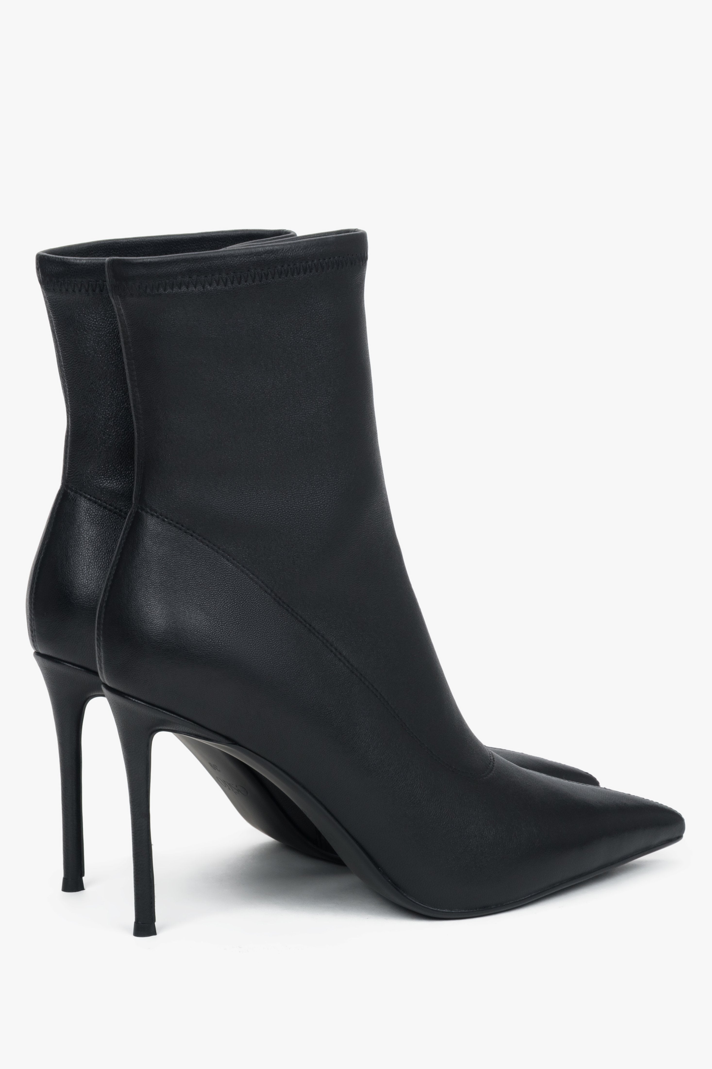 With an elastic shaft, black women’s ankle boots on a high stiletto heel by Estro.