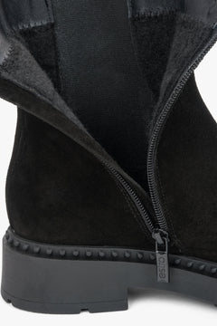 Black women's ankle boots with a decorative strap, crafted from premium Italian natural velour by Estro.