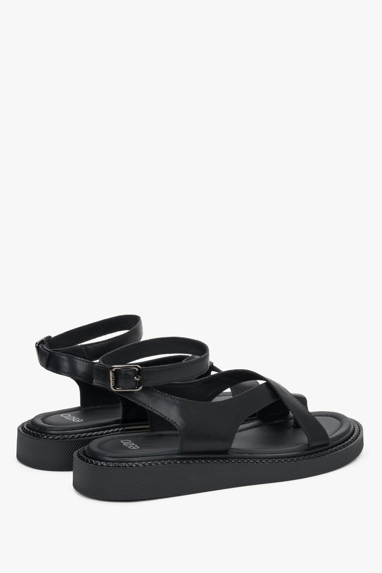 Stylish platform sandals with subtle silver-tone details.