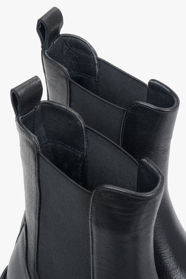 With an elastic insert, black women’s Chelsea boots made of genuine leather by Estro – details.