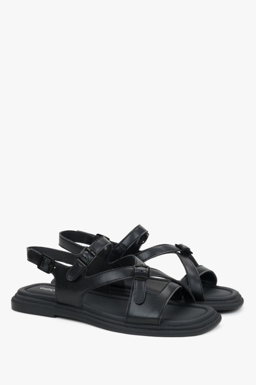 Black leather flat sandals for women with stylish black accents