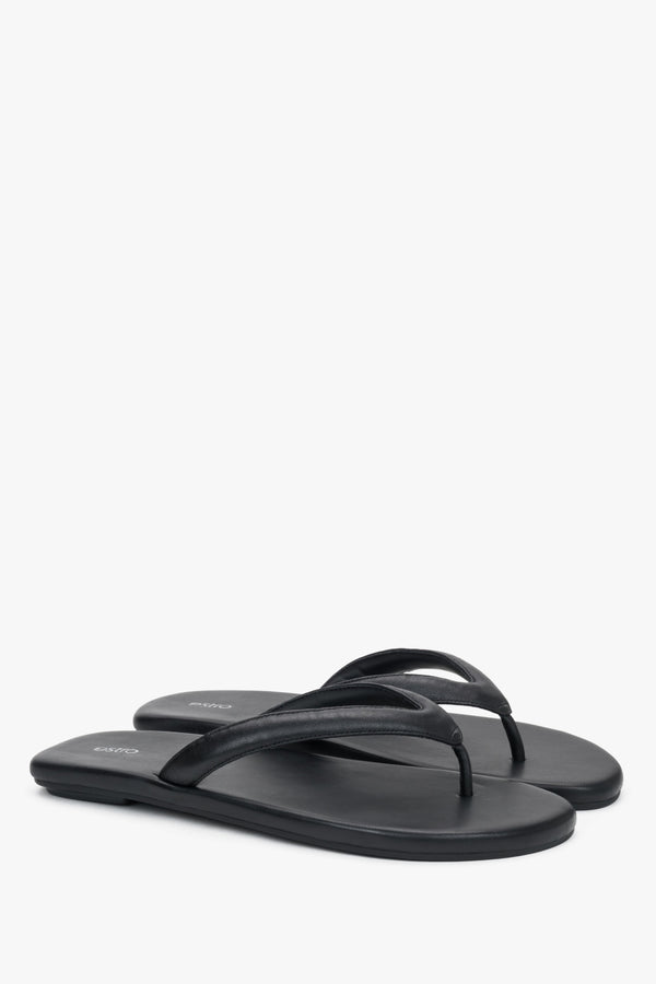 Women’s black flip-flops made from soft genuine leather by Estro.