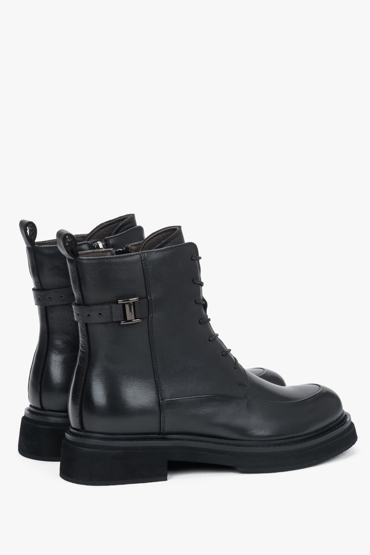 Women's black leather ankle boots Estro - side view highlighting the classic profile, sole construction, and lace detailing.