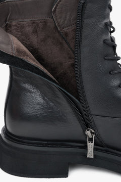 Black leather women's lace-up ankle boots with decorative detail, Estro.