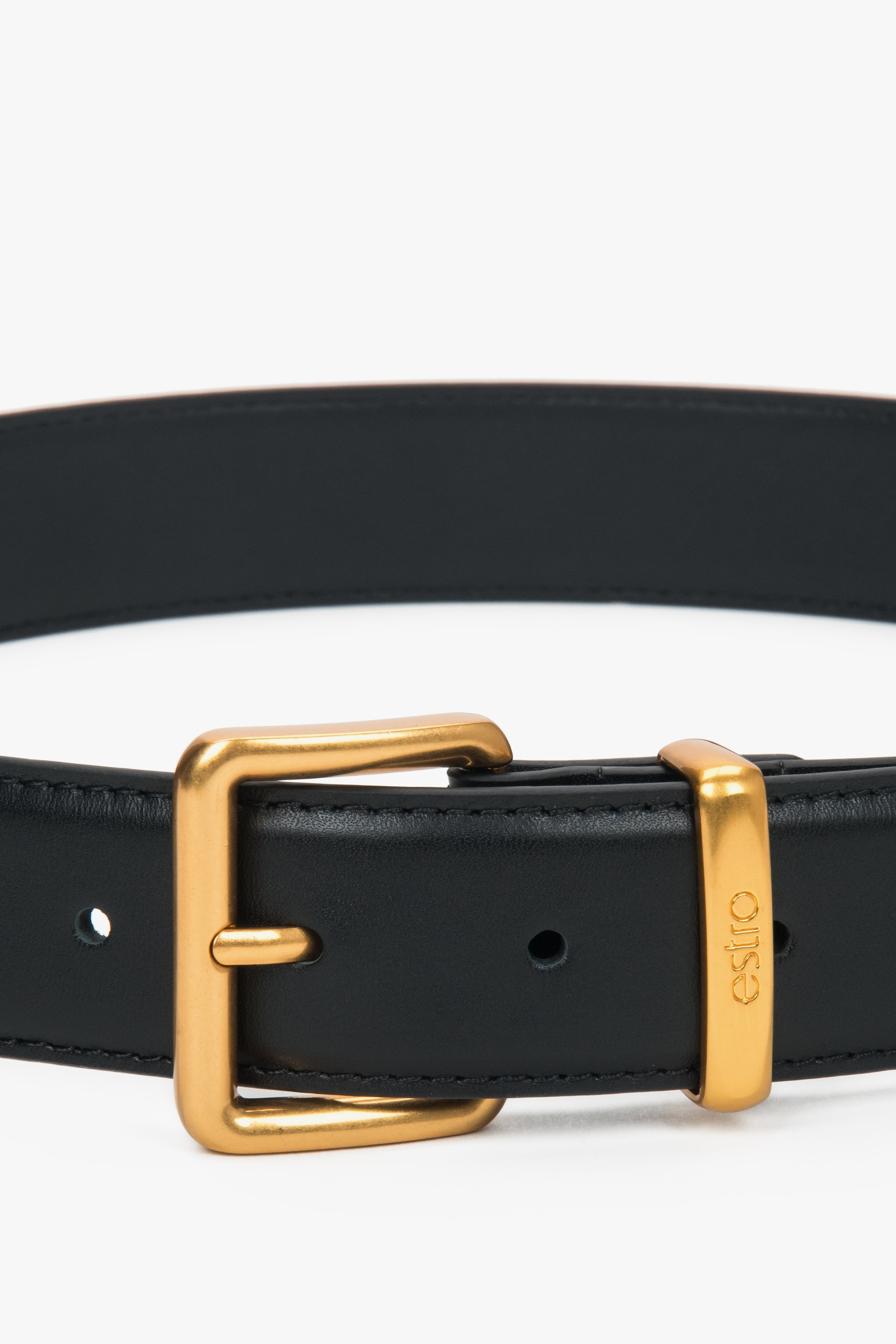 Women's black leather belt with a gold buckle, Estro.
