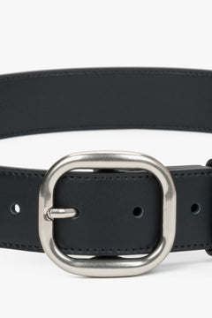Women's black leather belt with an oval silver buckle by Estro.