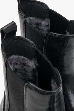 Estro - women's black Chelsea boots made of natural leather on a thick sole - close-up of details.