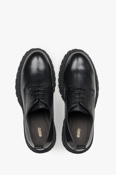 Black leather women's chunky lug-sole derby shoes, Estro.