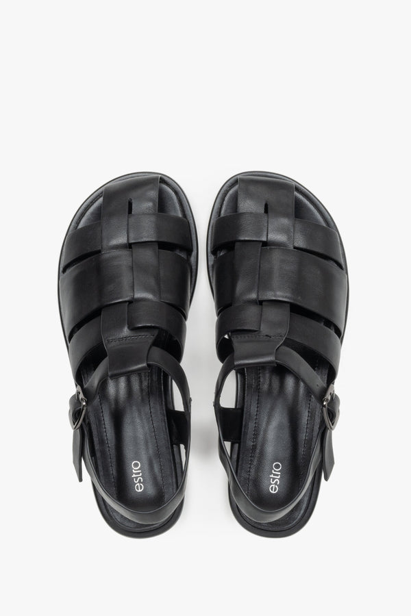 Women's flat black leather sandals in a classic fisherman style.