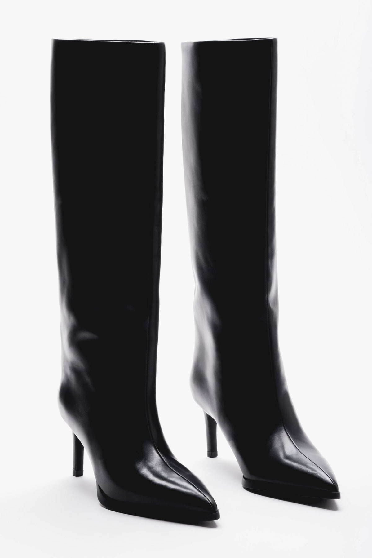 Made of natural leather, black women's high-heeled boots Estro.