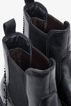 Estro - women's black leather Chelsea boots on a thick sole with brogue perforation.