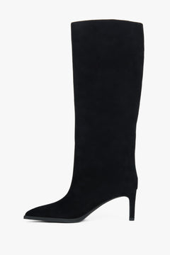 Close-up of the rich black natural velour texture and precise stitching.
