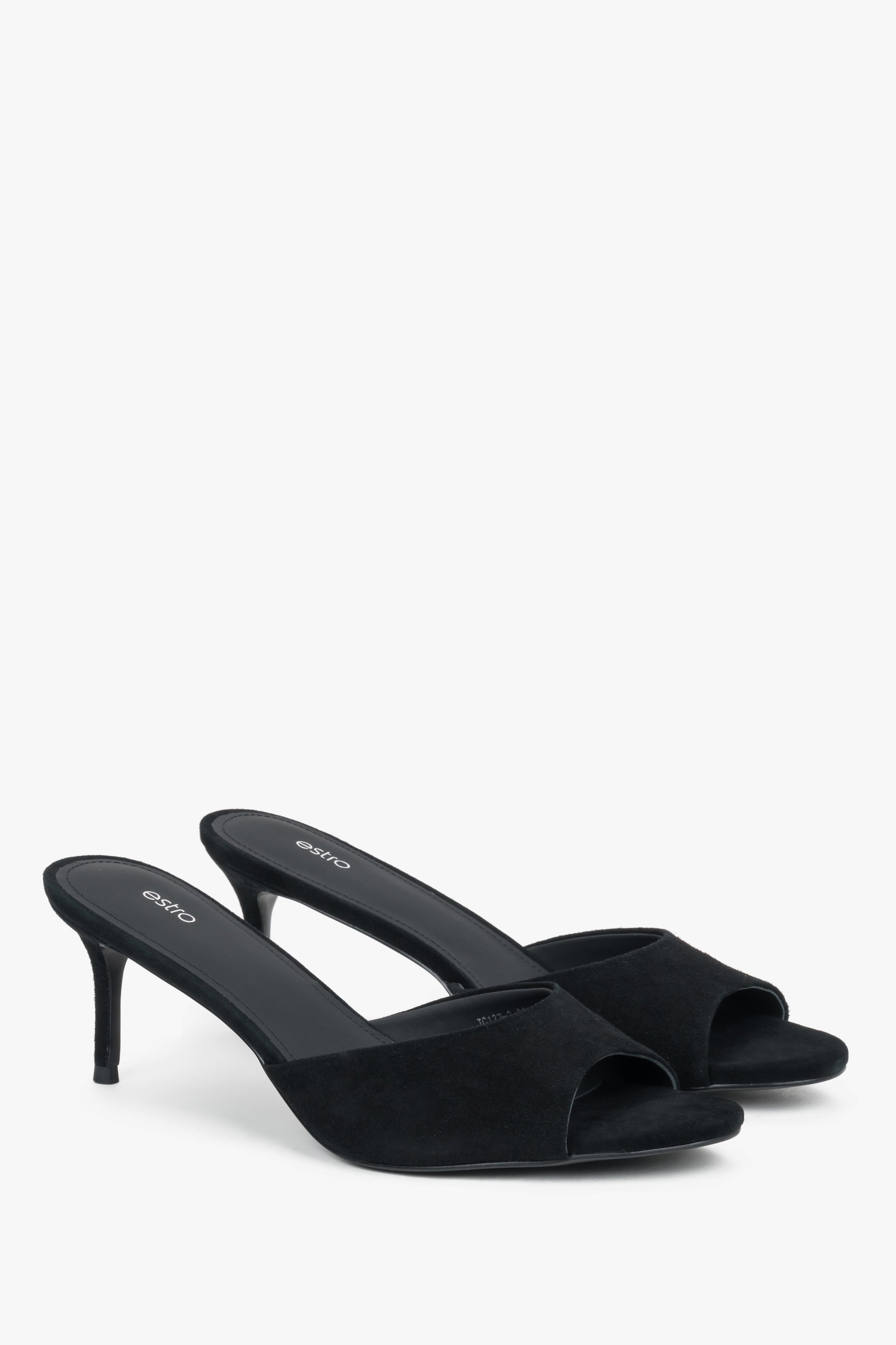 Angled view of women's black genuine velour mules with heel