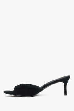 Side profile of women's black heeled mules by Estro