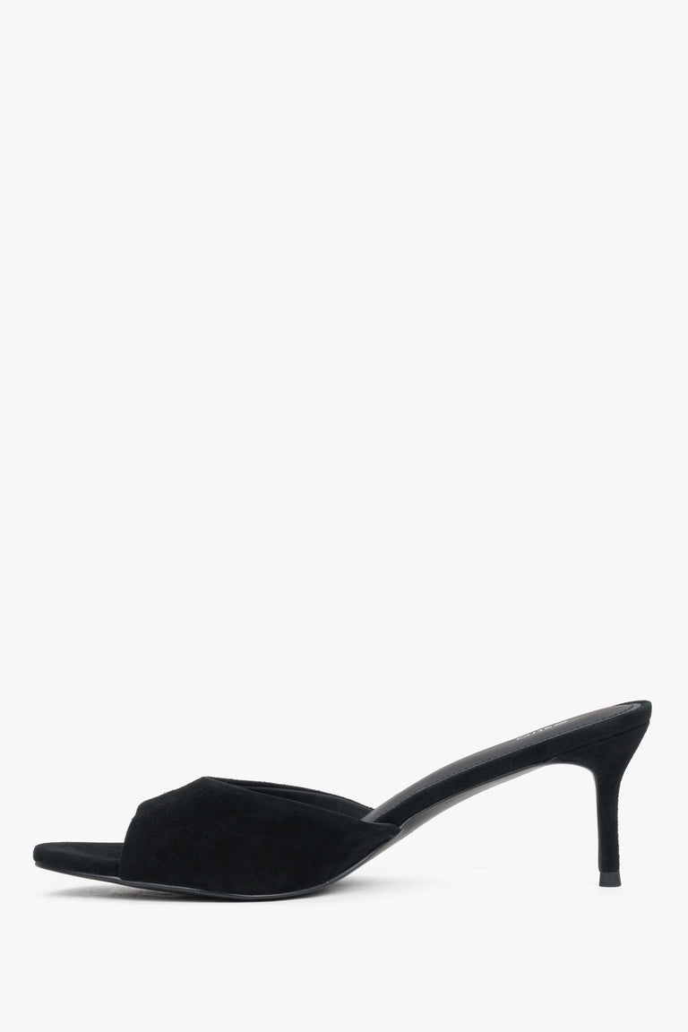 Side profile of women's black heeled mules by Estro