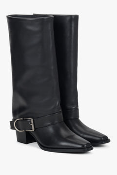 Black women’s high cowboy boots made of natural leather with buckle.