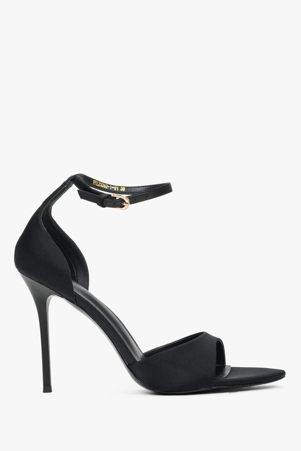 Side view of women's black high heel sandals by Estro