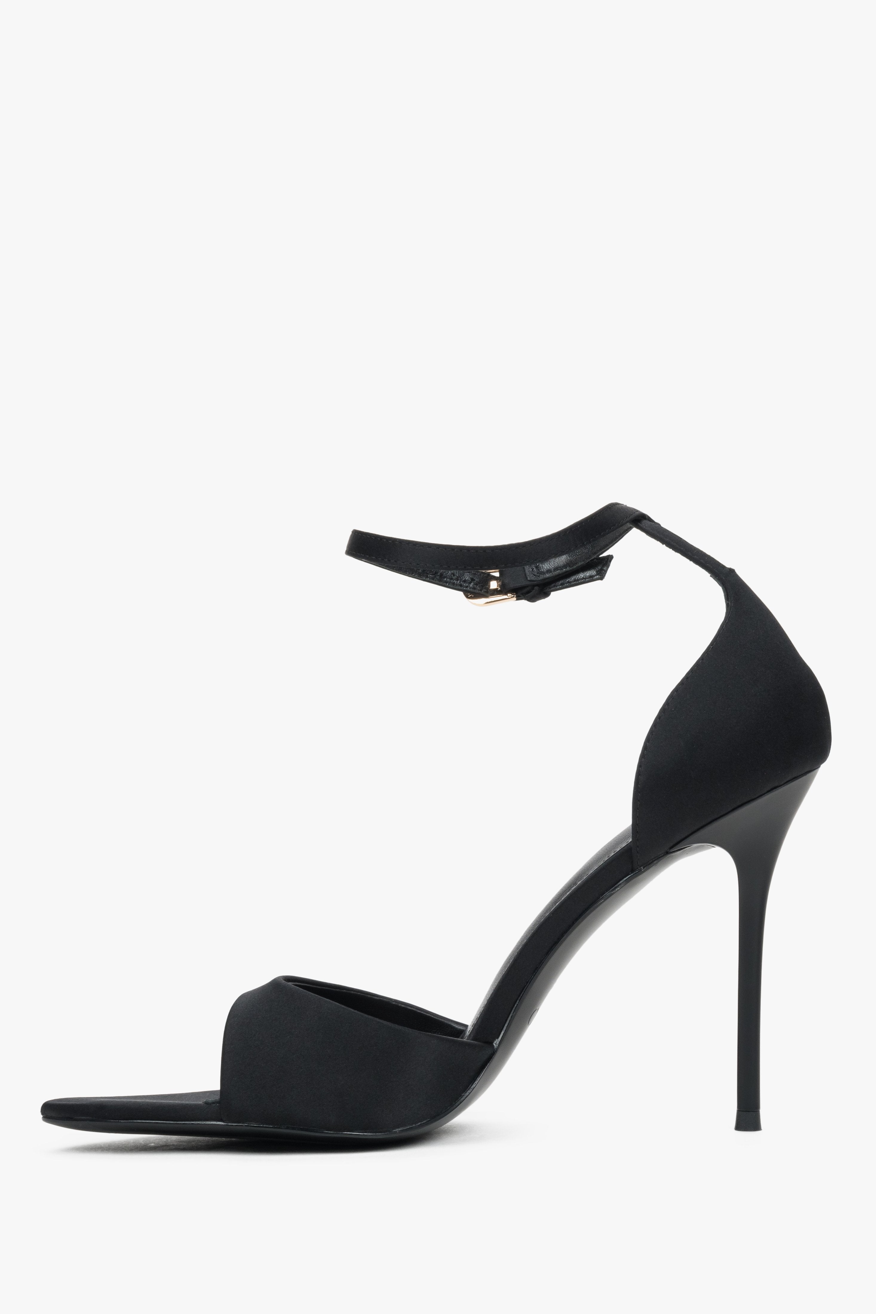 Low side view of women's black high heel sandals by Estro