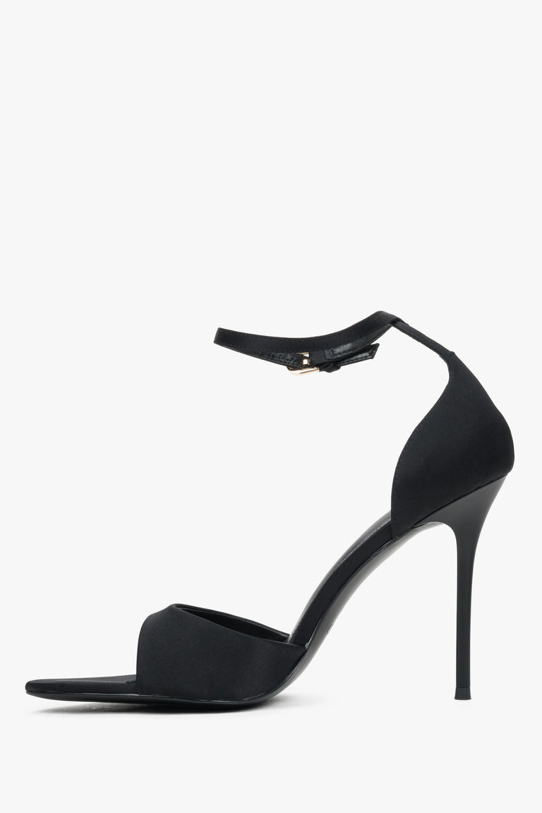 Low side view of women's black high heel sandals by Estro