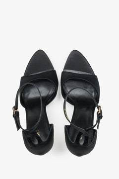 Pair of women's black high heel sandals by Estro