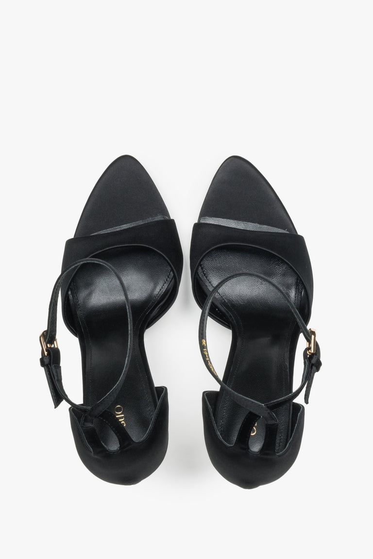 Pair of women's black high heel sandals by Estro