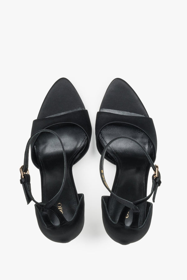Pair of women's black high heel sandals by Estro