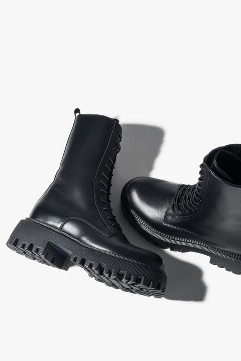 Detailed view of the sturdy sole and fine stitching, reflecting Italian craftsmanship.