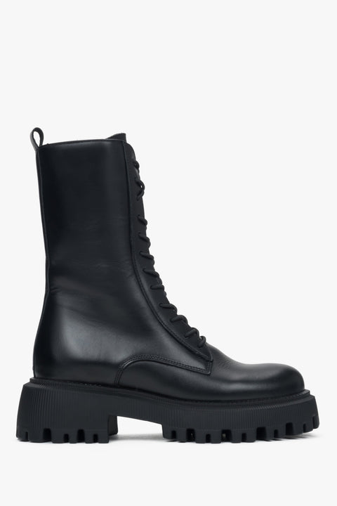 Elegant black boots with secure closure and refined finishes from Estro’s premium line.