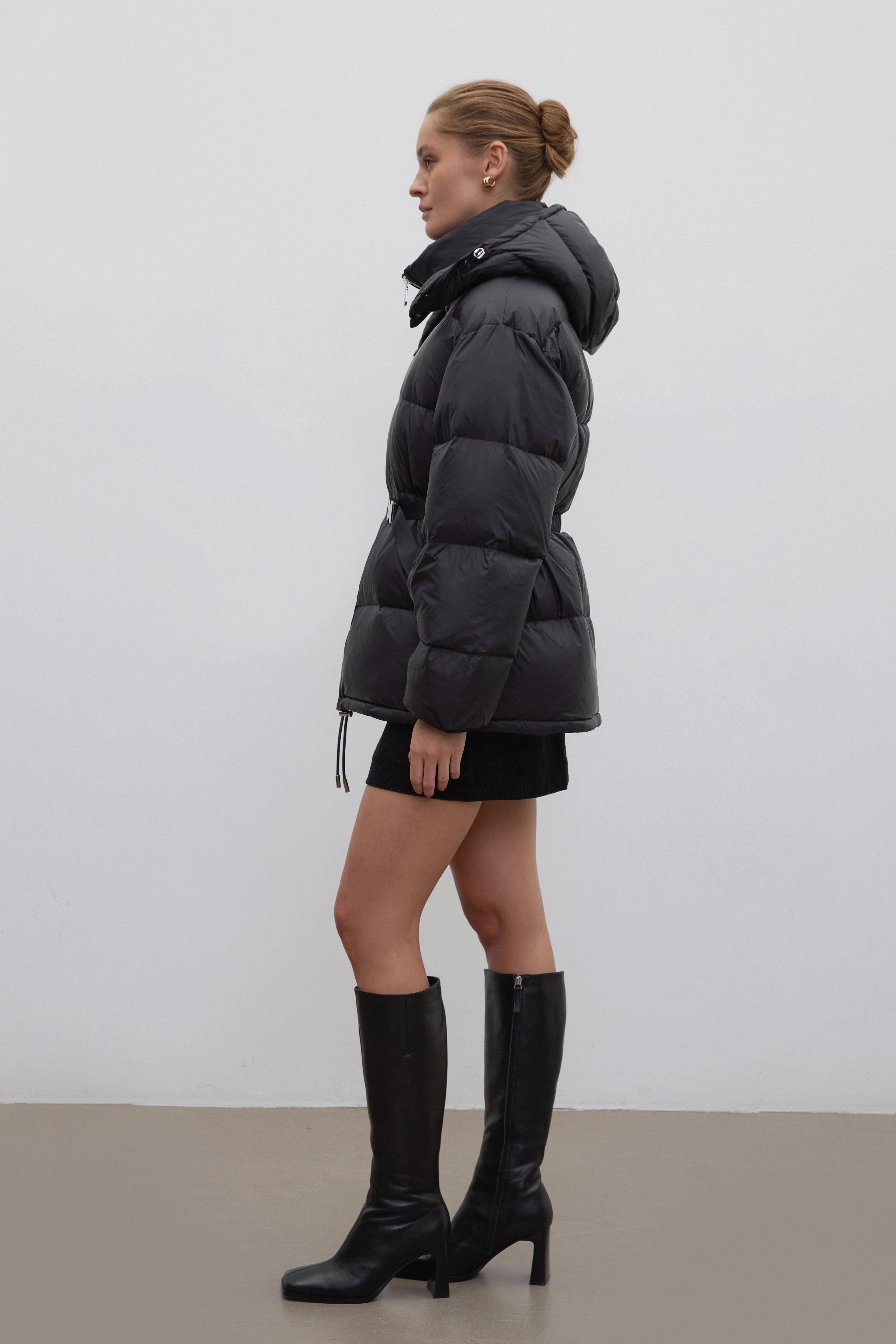 Women's black hip-length jacket with goose down and belt by Estro.