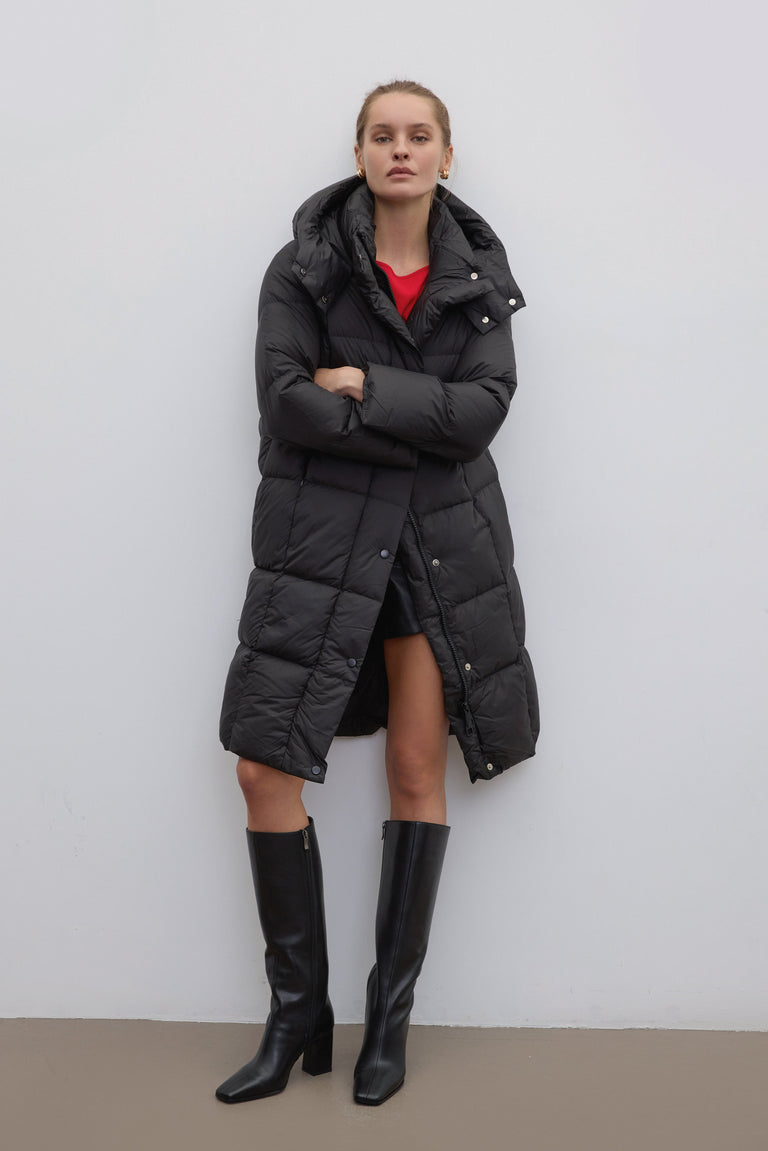 Black Estro women’s winter jacket, knee length.