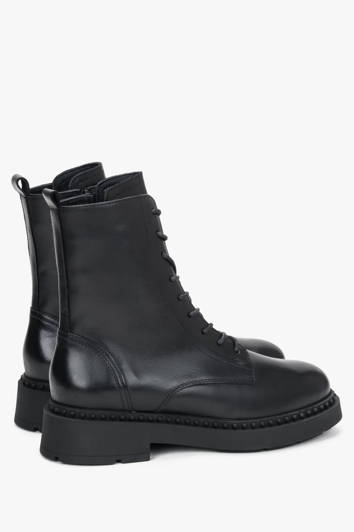 Elegant women's black lace-up leather ankle boots.