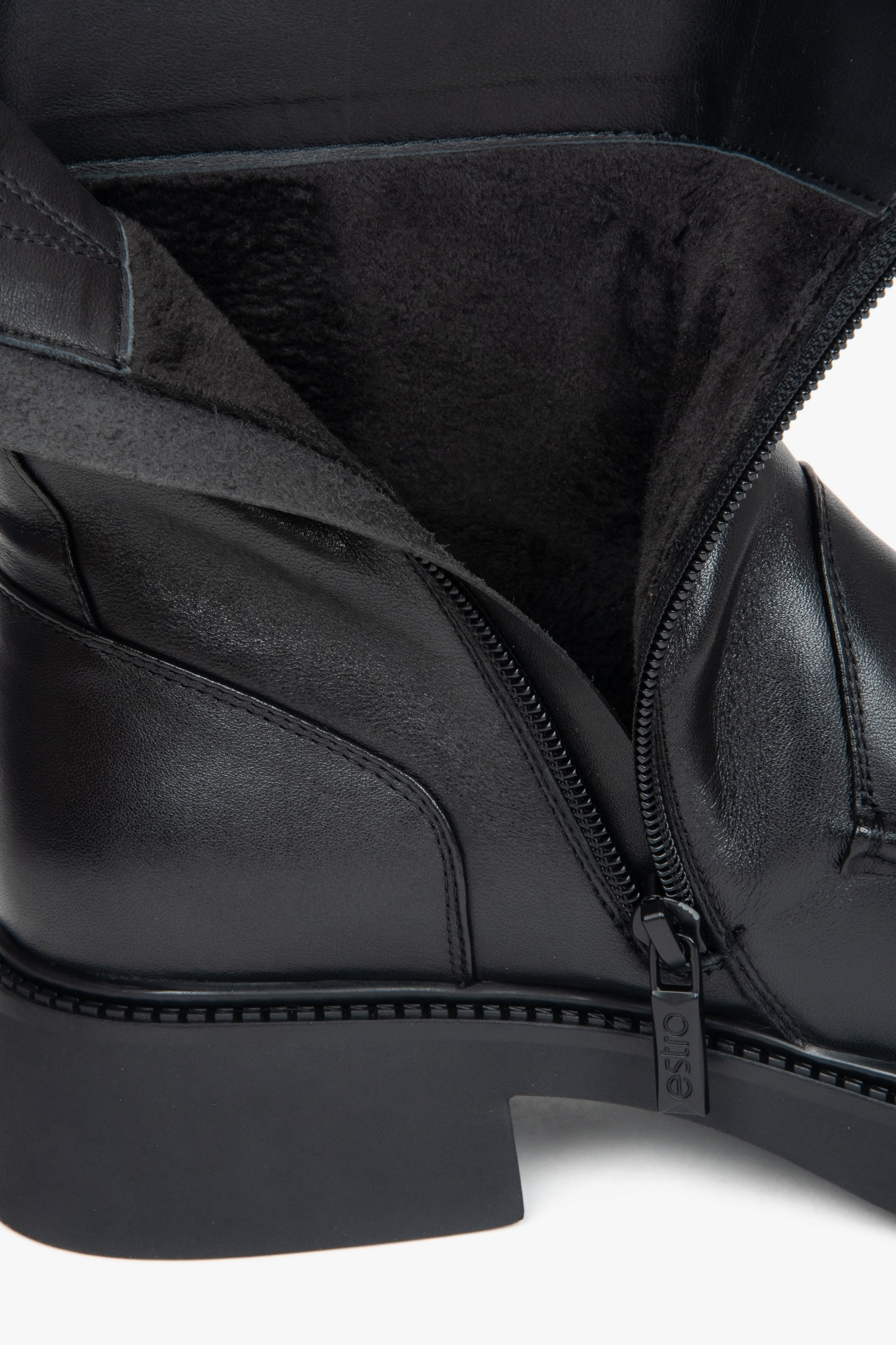 Women’s black leather ankle boots by Estro – details.