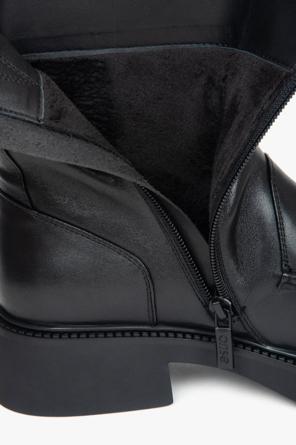 Women’s black leather ankle boots by Estro – details.