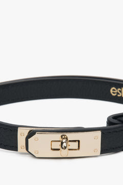 Close-up of the gold-tone turn-lock buckle, highlighting the sleek finish and high-quality craftsmanship of this Italian leather belt.