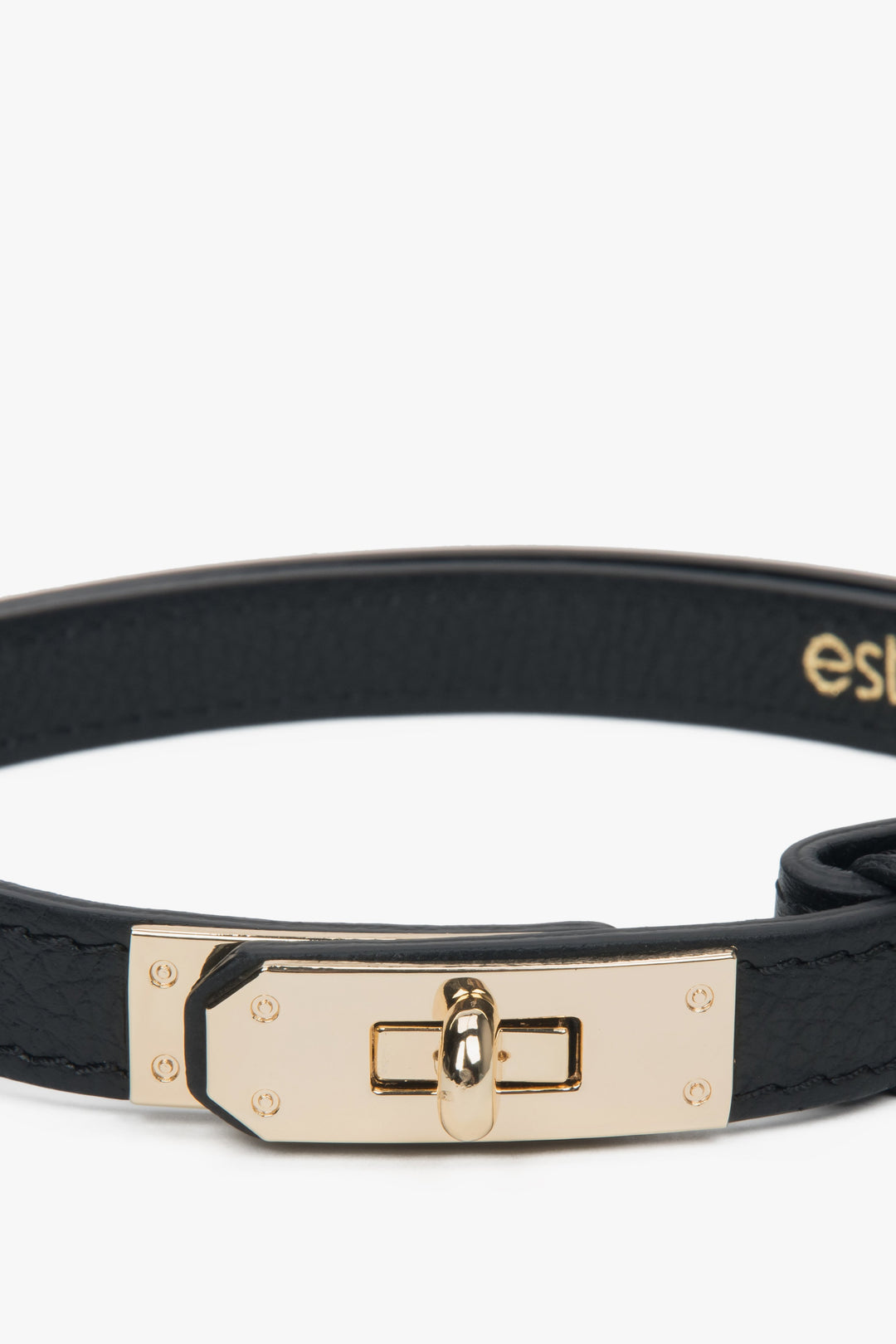 Close-up of the gold-tone turn-lock buckle, highlighting the sleek finish and high-quality craftsmanship of this Italian leather belt.