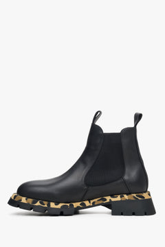 Women's black leather chelsea boots with animal print - shoe profile.