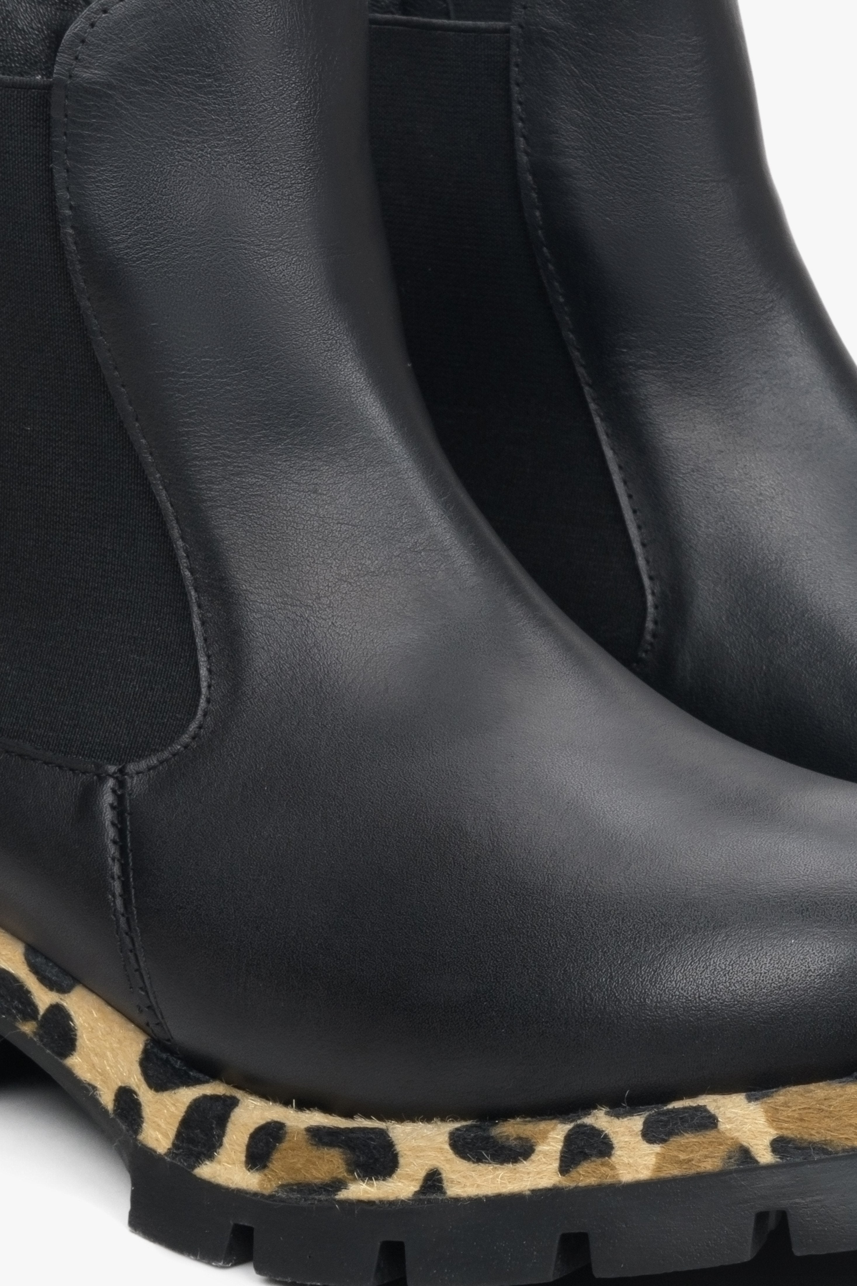 Women's black leather chelsea boots - shoe details.