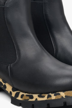 Women's black leather chelsea boots - shoe details.