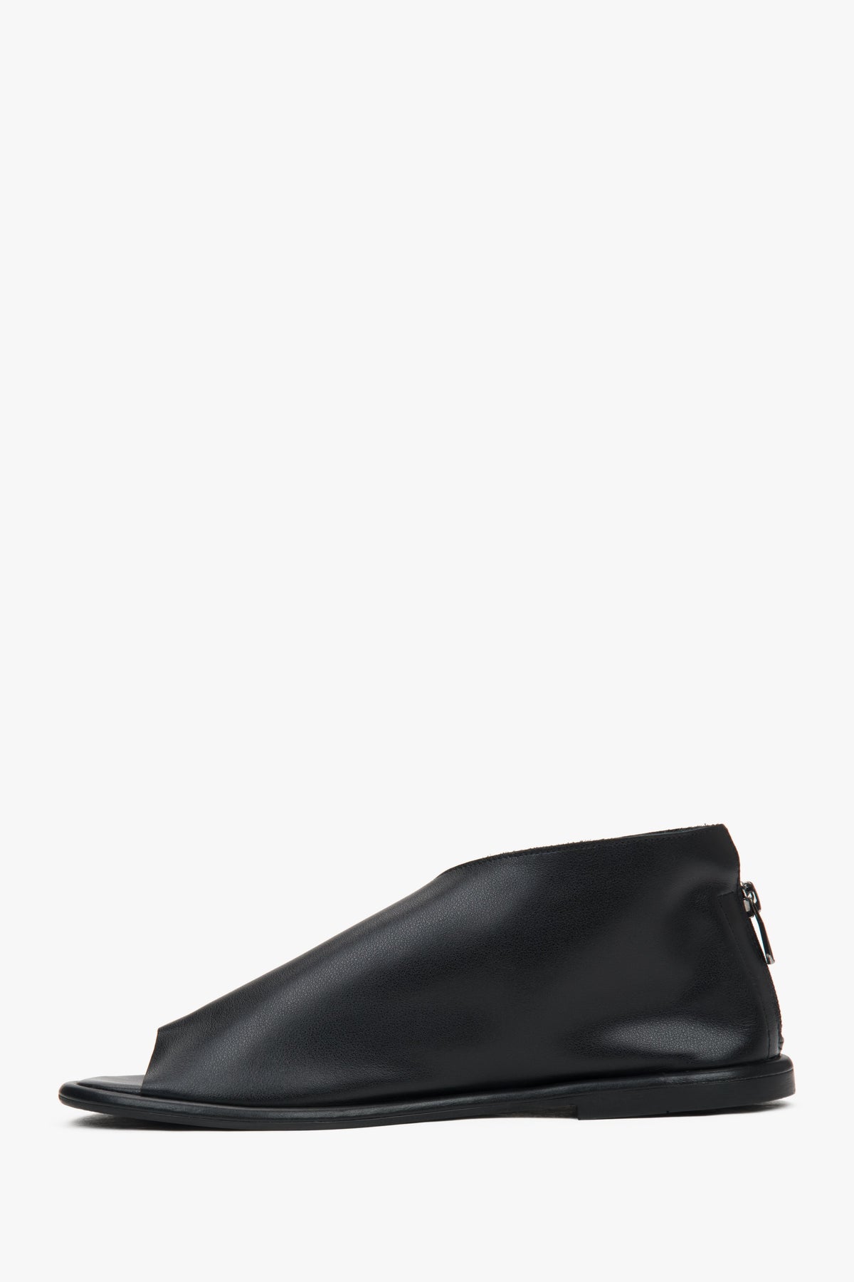 Elegant black leather sandals by Estro, designed for women with a closed-heel for a secure and comfortable fit. 