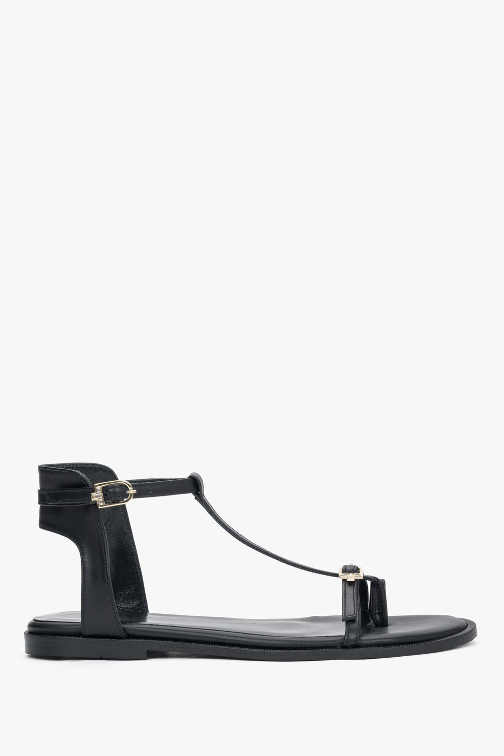 Women's black leather flat sandals with gold details by Estro