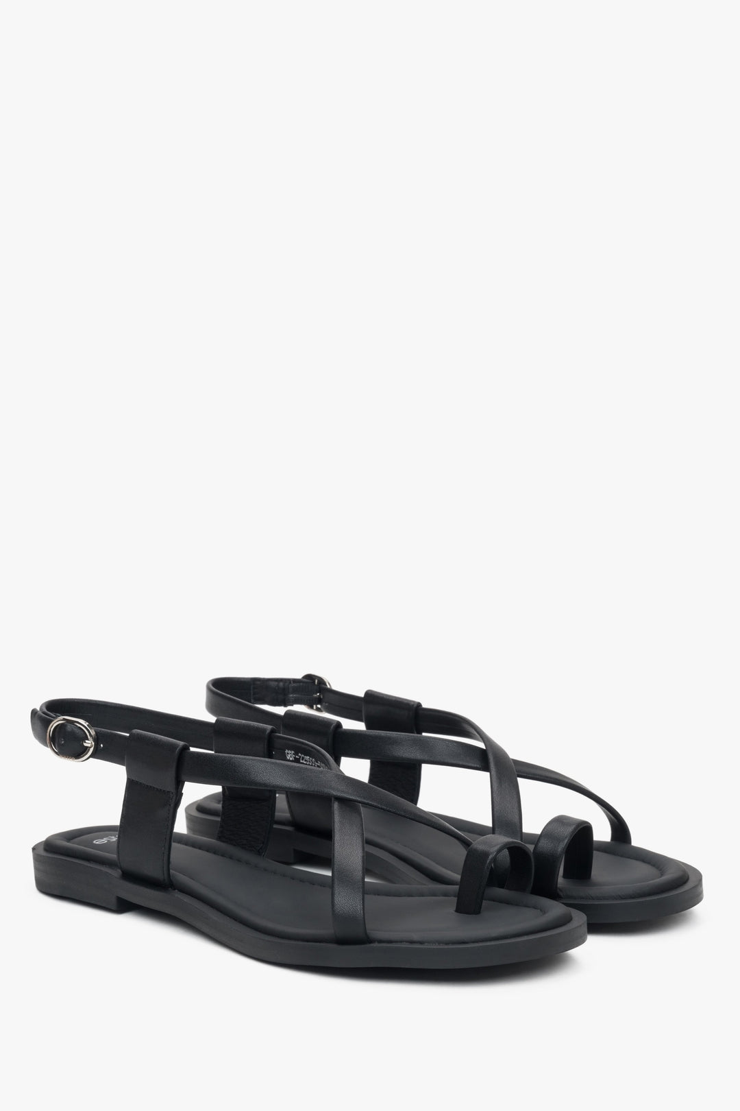 Women’s black leather flat sandals with a toe loop, Estro.