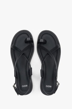 Women’s sandals, black, leather, on a flat sole with a toe loop, Estro.