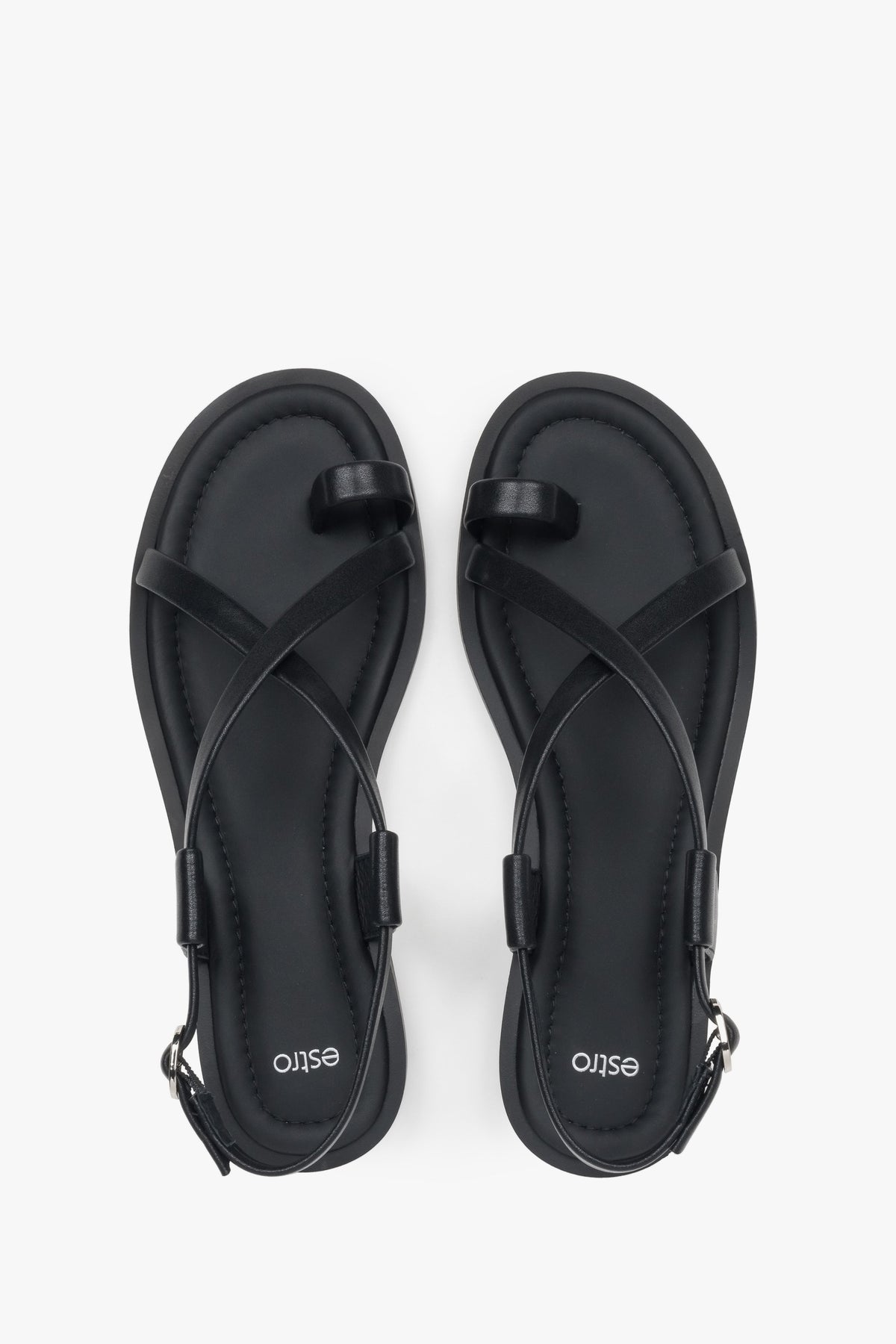 Women’s sandals, black, leather, on a flat sole with a toe loop, Estro.