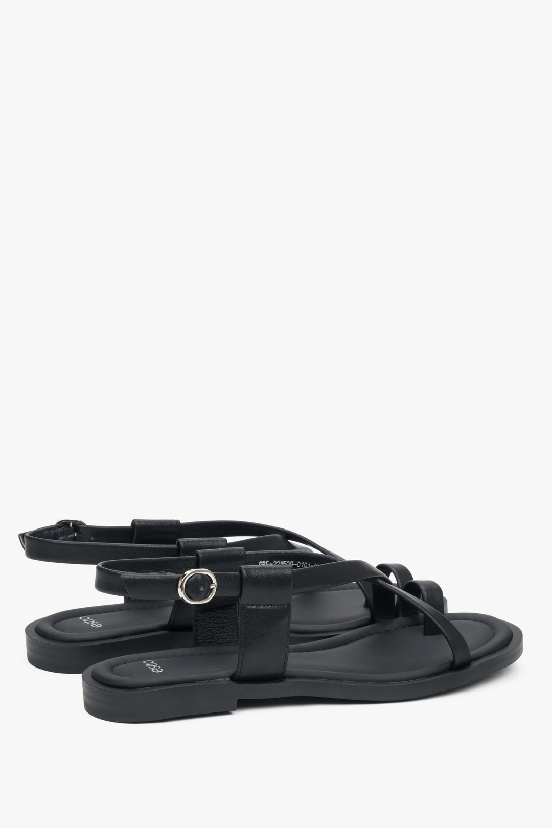 Made of genuine leather, black women’s sandals on a flat sole with a toe loop, Estro.