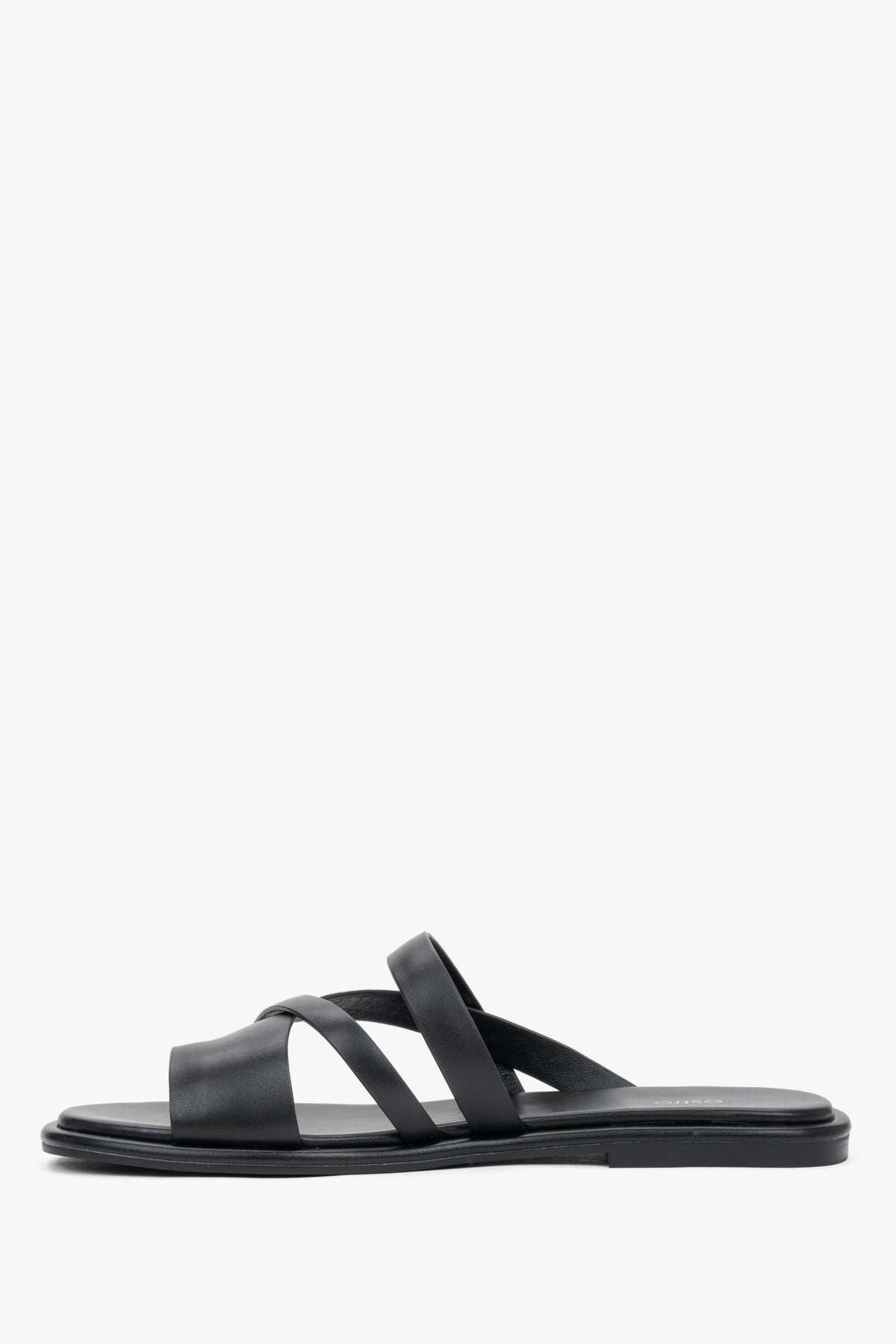 Elegant black genuine leather flat slides with a comfortable toe ring.