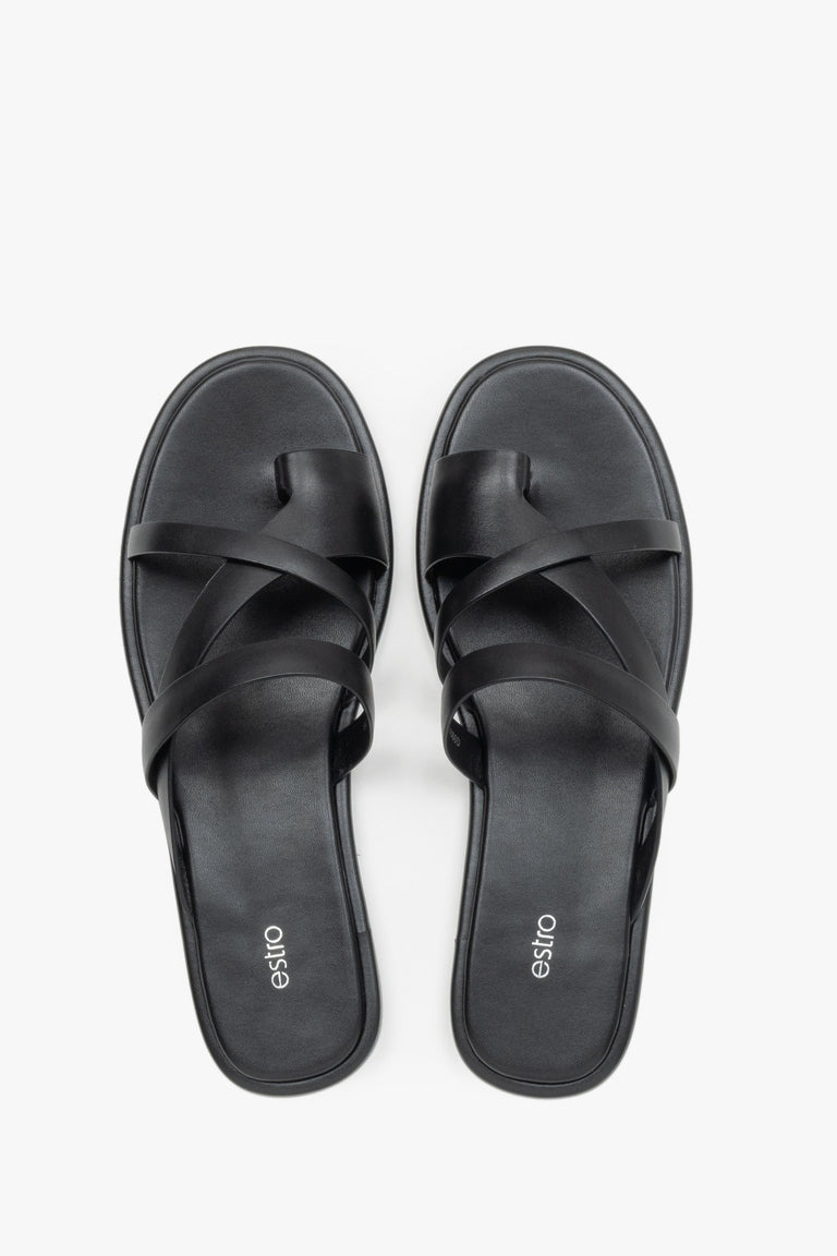 Women's minimalist black leather sandals with soft interwoven straps.